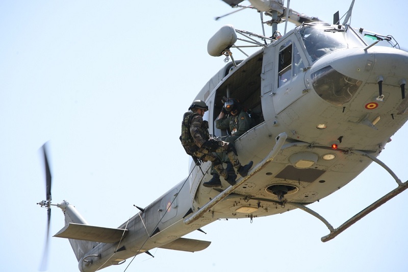 Fast-roping from an AB-212
